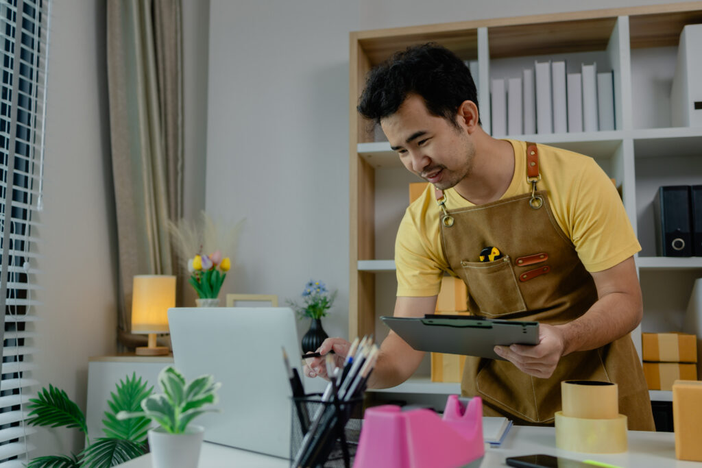 Home service business owner monitoring customer leads